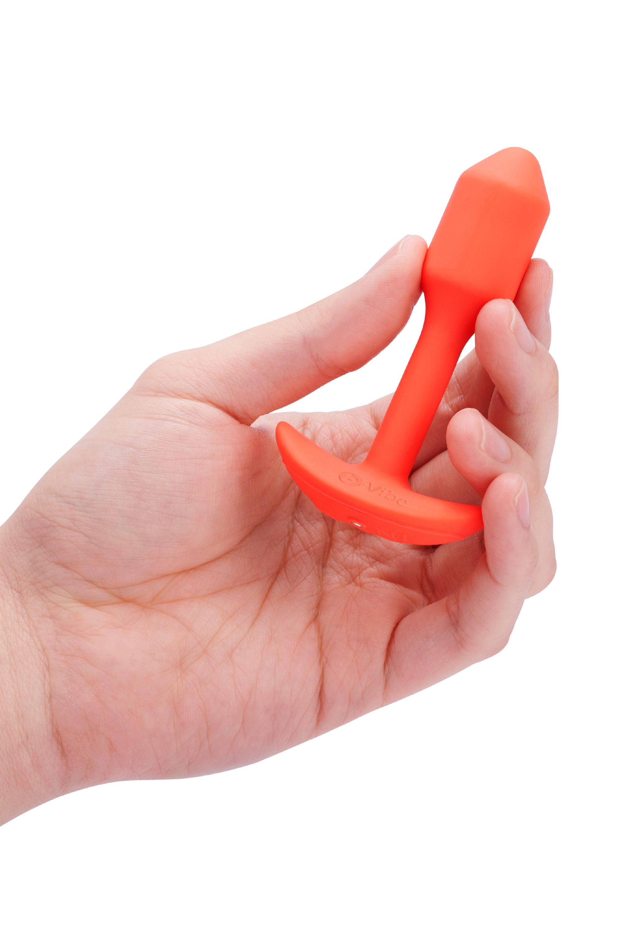 Анальна пробка з вібрацією розміру S B-Vibe Vibrating Snug Plug 1, помаранчева