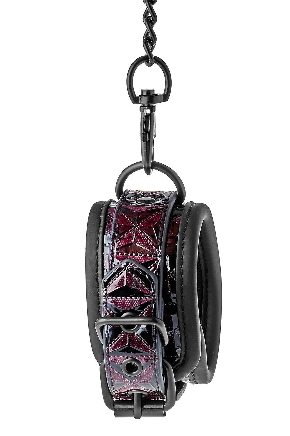 Поножі з фіолетовим тисненням Dream toys BLAZE Luxury Fetish на ланцюжку чорного кольору