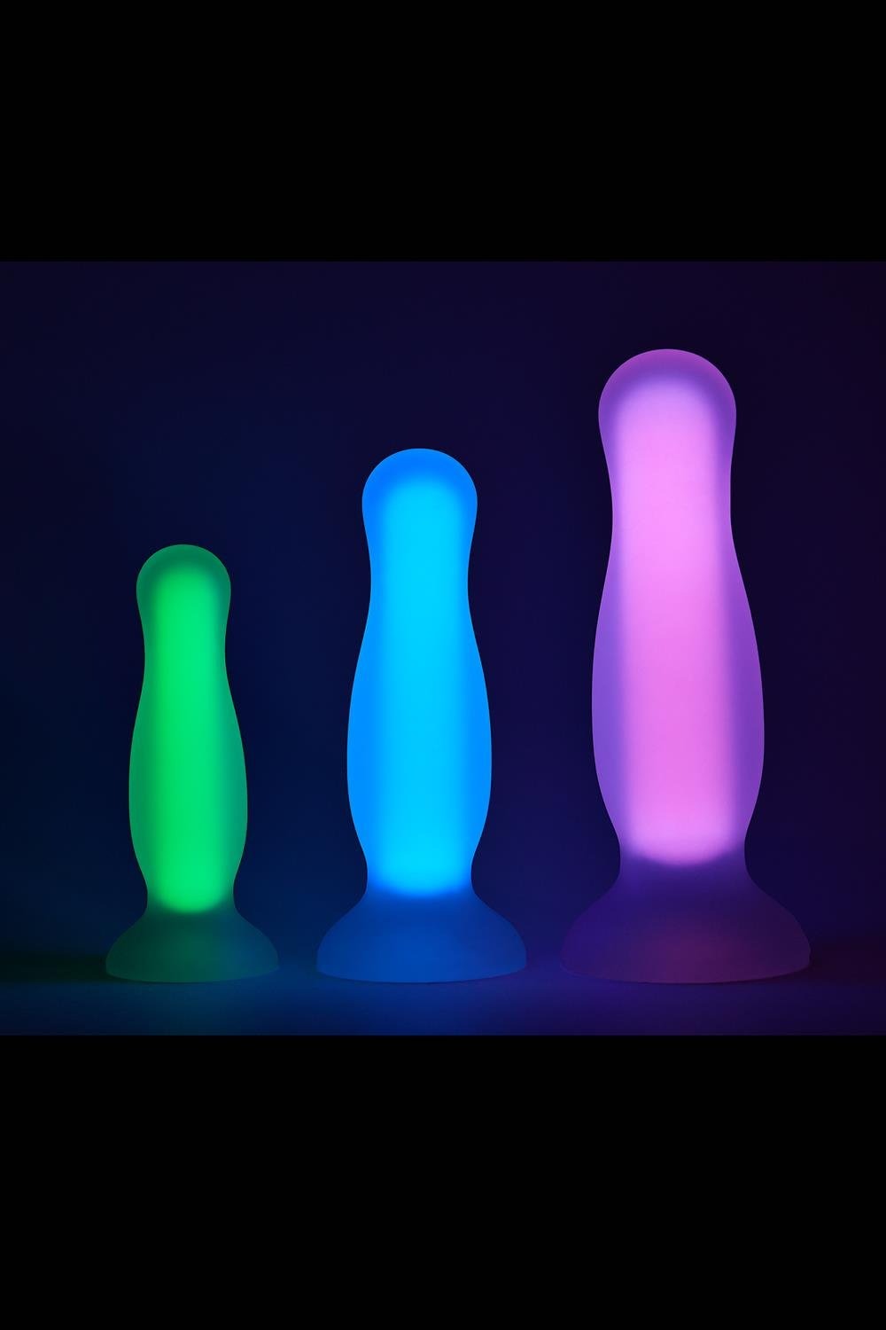 Анальна пробка люмінесцентна Dream Toys RADIANT Glow In The Dark рожева, L