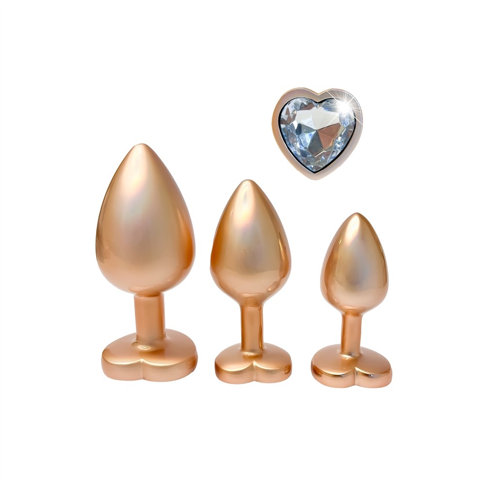 Набор из трёх анальных пробок Dream Toys Gleaming Love, размеры S, M, L, перламутрово-золотые