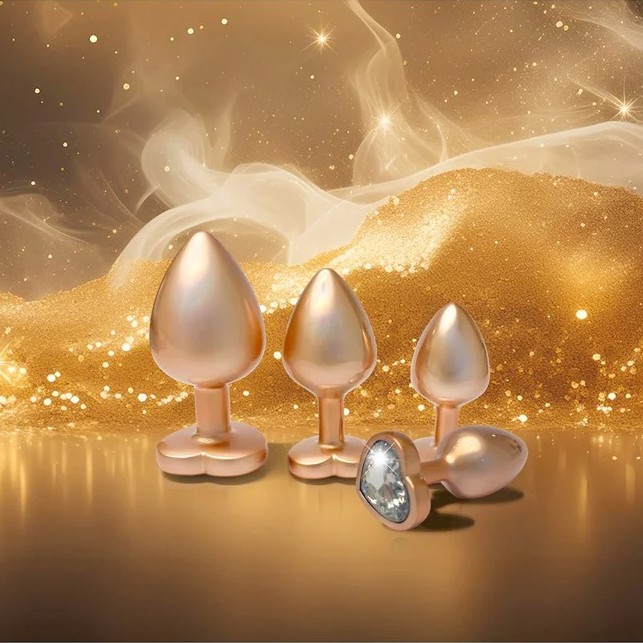 Набор из трёх анальных пробок Dream Toys Gleaming Love, размеры S, M, L, перламутрово-золотые