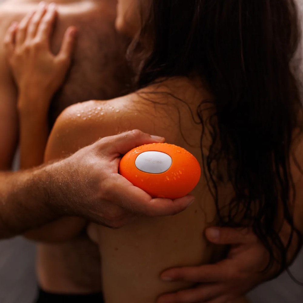 Кліторальний вібратор We-Vibe Temp Tangerine з функцією нагрівання та охолодження, помаранчевий
