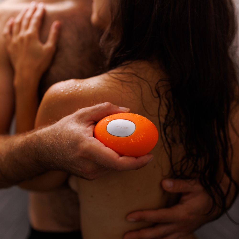 Кліторальний вібратор We-Vibe Temp Tangerine з функцією нагрівання та охолодження, помаранчевий