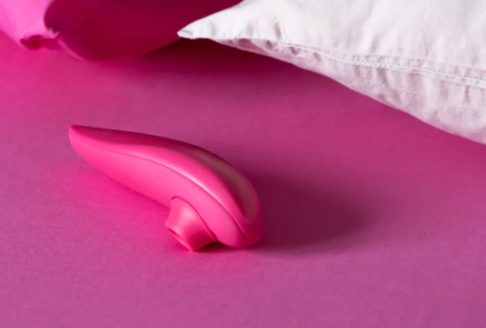 Вакуумний кліторальний стимулятор WOMANIZER Muse Pink Rose
